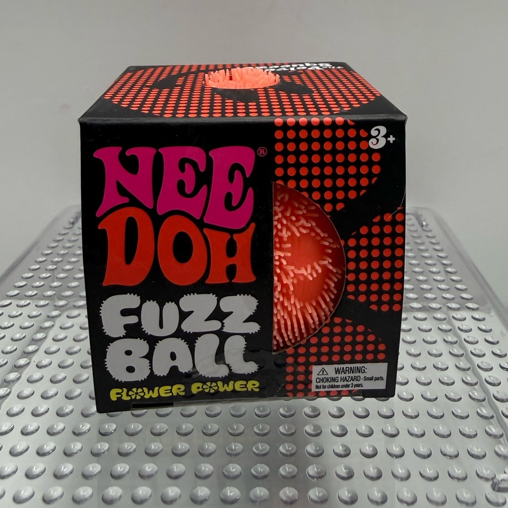 Orange NeeDoh Fuzz Ball Flower Power
